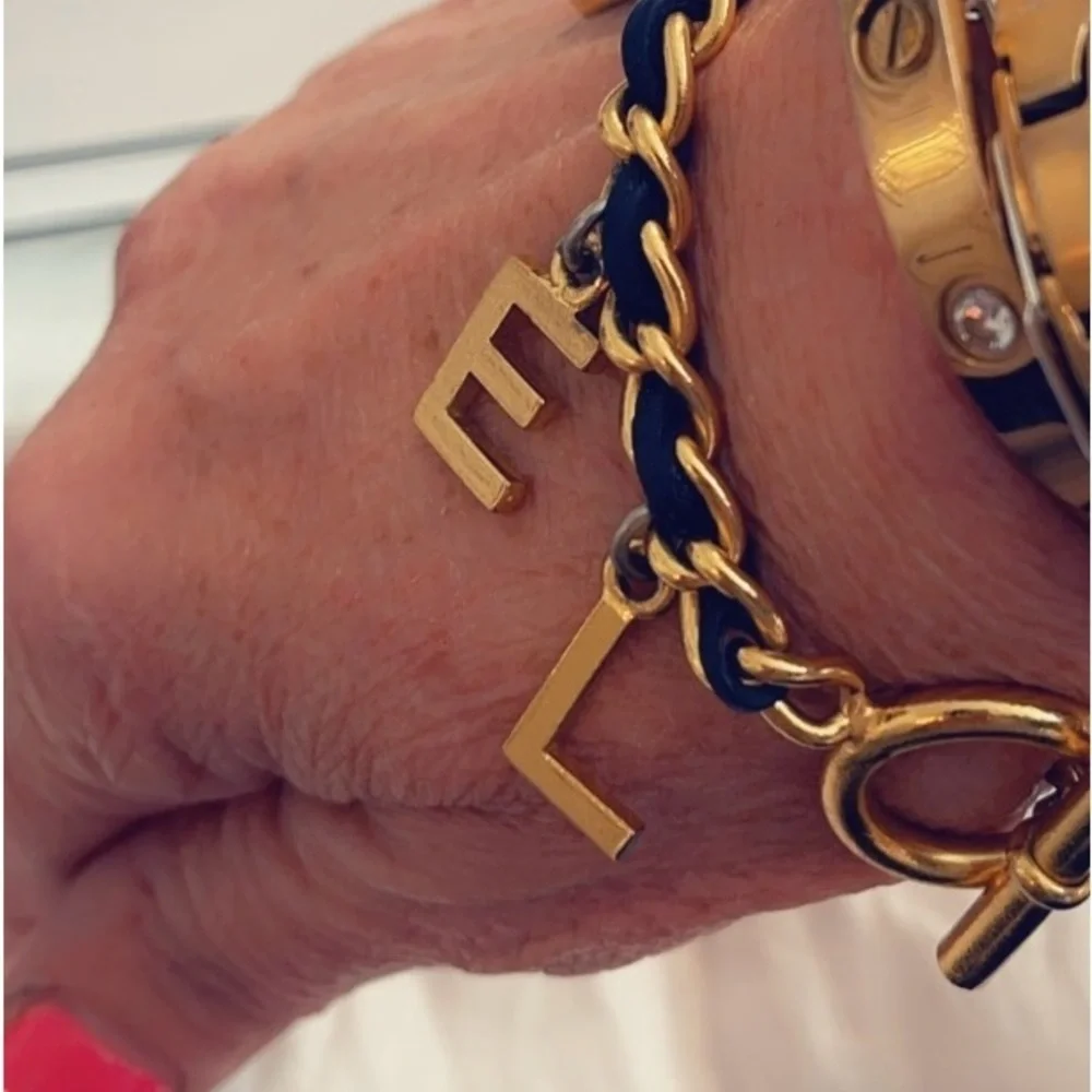 CHANEL RARE VINTAGE TOGGLE LEATHER CHARM BRACELET